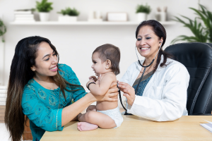 parent nursing their baby