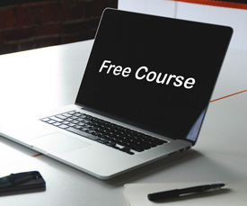 Laptop that says free course on the screen. 