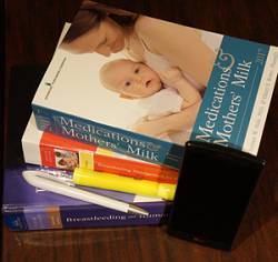 stack of lactation books