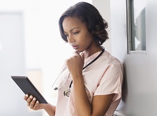 Woman looking at tablet